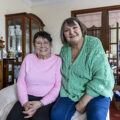 Older Person & Volunteer in sitting room