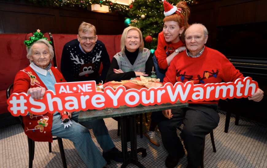 Picture of ALONE CEO Seán Moynihan, newsreader Eileen Dunne, volunteer Jennifer Keane, and Olive Boothman and John Fitzpatrick who receive support from ALONE