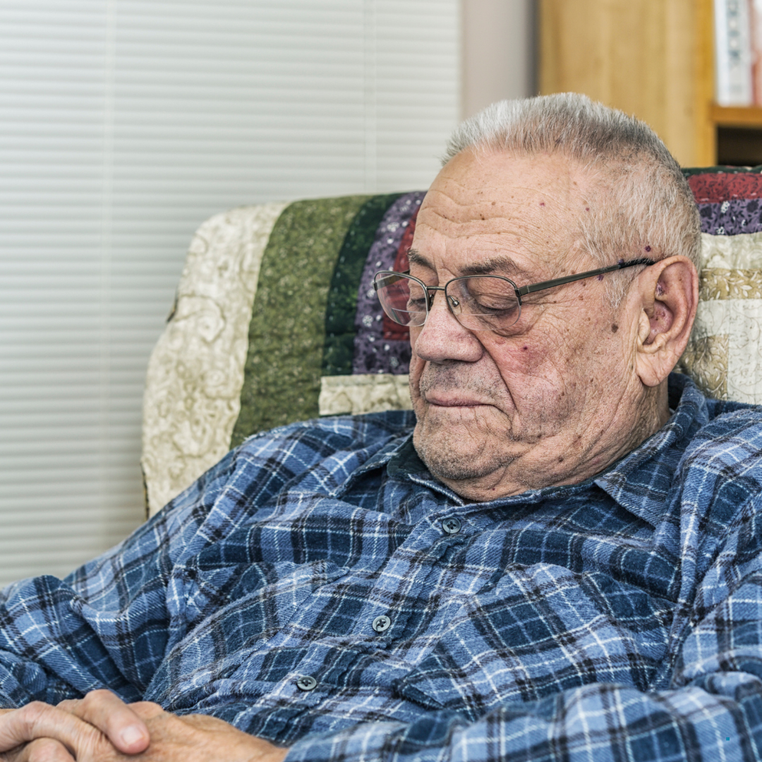 Older person sitting at home